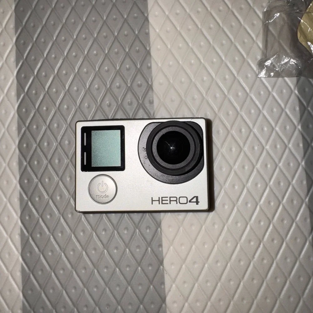 Hero4 GoPro with lots of accessories. Used once